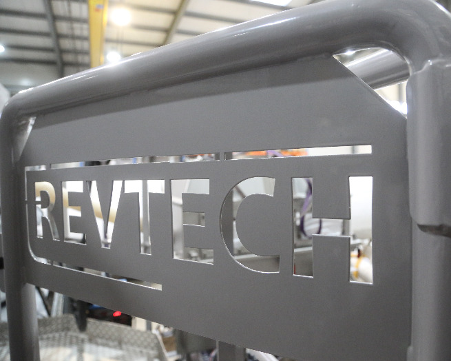 Revtech engraving